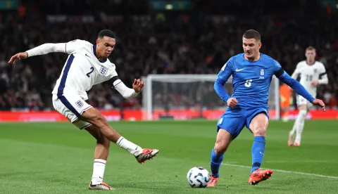 epa11653394 Trent Alexander-Arnold of England (L) and Christos Tzolis of Greece (R) in action during the UEFA Nations League match between England and Greece in London, Great Britain, 10 October 2024. EPA/ANDY RAIN