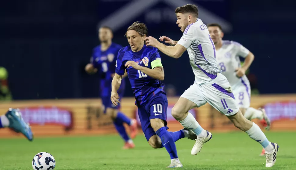 Zagreb, 12.10.2024 - Utakmica 3. kola Lige nacija između reprezentacja Hrvatske i Škotske na stadinu u Maksimiru. Na slici Luka Modrić, Ryan Christie.foto HINA/ Damir SENČAR/ ds