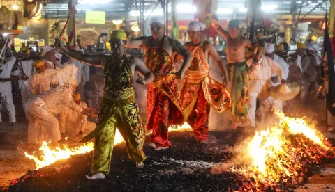 epa11654960 Malaysian ethnic Chinese walk on burning charcoal during the last day of the Nine Emperor Gods festival in Kuala Lumpur, Malaysia, 11 October 2024. The Nine Emperor God Festival, also known as the Vegetarian Festival, is an annual Taoist celebration held during the ninth lunar month of the Chinese calendar. During the nine-day period, worshipers will abstain from consuming meat, only consume vegetarian food, and make merit, all aimed at cleansing their body and mind. The festival is mainly celebrated in Southeast Asian countries. EPA/FAZRY ISMAIL