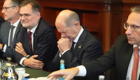 epa11647368 German Chancellor Olaf Scholz (C) reacts during his bilateral meeting with President of Namibia Nangolo Mbumba (not pictured) at the City Hall in Hamburg, Germany, 07 October 2024. Both met for bilateral talks on the sidelines of the first Hamburg Sustainability Conference (HSC). EPA/MARCUS BRANDT/POOL