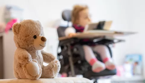 03 February 2020, Baden-Wuerttemberg, Backnang: A teddy bear sits in front of a child with spinal muscular atrophy (SMA) sitting in a therapy chair. Photo: Sebastian Gollnow/dpa /DPA/PIXSELL