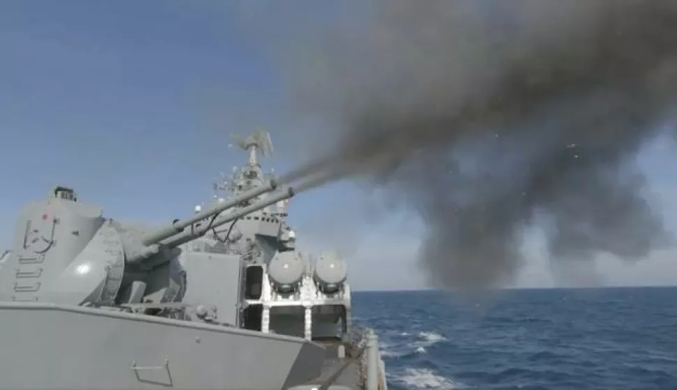 epa09768521 A handout still image taken from handout video made available by the Russian Defence Ministry press service shows Russian cruiser Moskva of the Black Sea Fleet conducting an artillery battle and destroying a mock enemy submarine in Black Sea near Sevastopol, Crimea, 18 February 2022. Since January 20, a series of major exercises have been taking place on all four fleets of the Russian Navy and the Caspian Flotilla. The Russian Defense Ministry reported that 140 ships and vessels, as well as over 10 thousand military personnel, are participating in them. Six large landing ships are transferred to the Black Sea from the Northern and Baltic Fleets. Two Project 1164 Atlant heavy missile cruiser, Varyag and Marshal Ustinov, are already in the Mediterranean, and a third, Moskva, may join them. Each of them is armed with 16 Vulkan anti-ship missiles. EPA/RUSSIAN DEFENCE MINISTRY PRESS SERVICE HANDOUT HANDOUT EDITORIAL USE ONLY/NO SALES