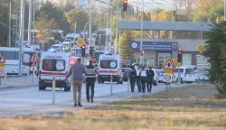 epa11677419 Ambulances arrive as police secure the area during a terror attack at (TUSAS) Turkish Aveospace and Aviation Center's headquearter in Ankara, Turkey 23 Ocober 2024. Turkey's interior ministry reports that several people are "dead and injured" following an explosion at the headquarters of a Turkish aviation firm close to Ankara. EPA/NECATI SAVAS