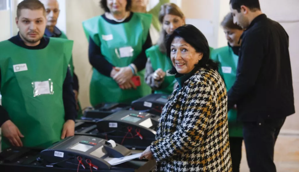 epa11684080 Georgian President Salome Zourabichvili casts her ballot at a polling station during parliamentary elections in Tbilisi, Georgia, 26 October 2024. A total of 18 parties are participating in the parliamentary elections in Georgia. Three thousand, one hundred and eleven polling stations opened for the parliamentary elections, including 67 abroad. Voting abroad will be possible in 53 cities in 42 countries. EPA/DAVID MDZINARISHVILI