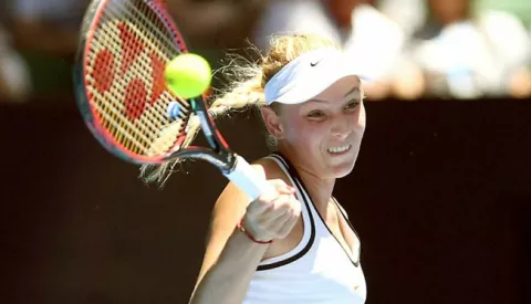 epa05729300 Donna Vekic of Croatia in action against Caroline Wozniacki of Denmark during round two of the Women's Singles at the Australian Open Grand Slam tennis tournament in Melbourne, Victoria, Australia, 19 January 2017. EPA/DEAN LEWINS AUSTRALIA AND NEW ZEALAND OUT------2x color - sport