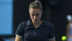 epa10410474 Petra Martic of Croatia reacts during her match against Viktorija Golubic of Switzerland during their first round match at the Australian Open tennis tournament in Melbourne, Australia 17 January 2023. EPA/FAZRY ISMAIL