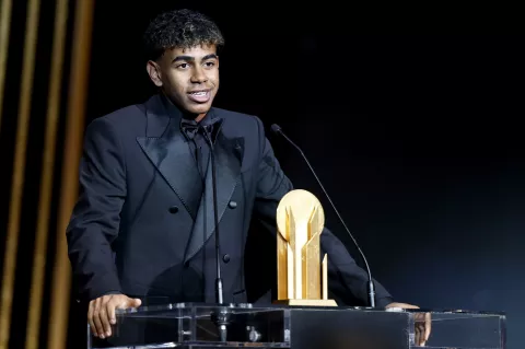 epa11689435 Barcelona and Spain forward Lamine Yamal delivers his speech after receiving the Kopa Trophy for the best player under the age of 21 at the Ballon d'Or 2024 ceremony at the Theatre du Chatelet in Paris, France, 28 October 2024. EPA/MOHAMMED BADRA