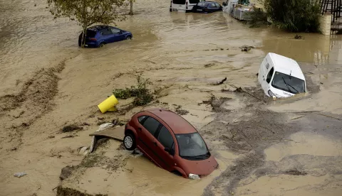 epa11690460 A view of partially submerged vehicles after the Guadalhorce River burst its banks following torrential rains in Alora, Malaga, Spain, 29 October 2024. The area is currently facing significant rainfall. EPA/JORGE ZAPATA