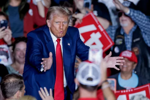 epa11676515 Former US president and Republican presidential nominee Donald Trump reacts at the conclusion of a campaign rally at the Greensboro Coliseum in Greensboro, North Carolina, USA, 22 October 2024. Trump is running against Democratic US Vice President Kamala Harris. EPA/ERIK S. LESSER