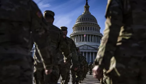 epa08958805 Members of the New York National Guard march in formation on the east front of the US Capitol building on Capitol Hill in Washington, DC, USA, 22 January 2021. Approximately 25,000 National Guard troops from all over the country were activated in order to protect the US Capitol and other locations in Washington following the January 6th attack on the Capitol by a pro-Trump mob. EPA/SAMUEL CORUM