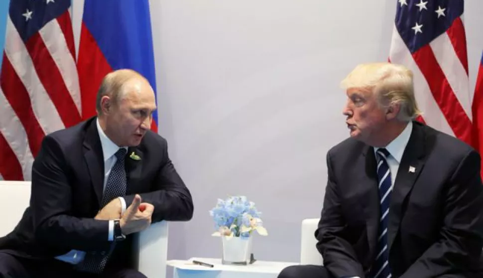 epa06073356 Russian President Vladimir Putin (L) and US President Donald J. Trump (R) meet on the sidelines of the G20 summit in Hamburg, Germany, 07 July 2017. The G20 Summit (or G-20 or Group of Twenty) is an international forum for governments from 20 major economies. The summit is taking place in Hamburg from 07 to 08 July 2017. EPA/MICHAEL KLIMENTYEV/SPUTNIK/KREMLIN POOL/POOL MANDATORY CREDIT