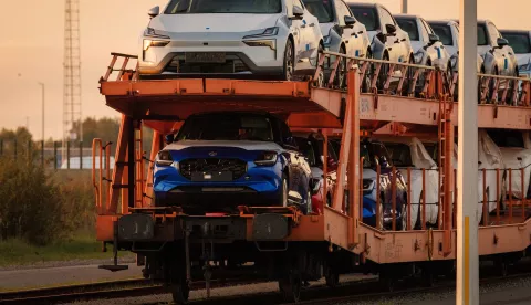 epa11687566 Cars on a transport train parked around ICO International Car Operators inlet terminals at the port in Zeebrugge, Belgium, 27 October 2024, as EU tariffs on Chinese electric vehicles come into force. The ICO is a global market leader at the port, handling and storing roll-on/roll-off cargo on its various deep-sea terminals. EPA/OLIVIER MATTHYS