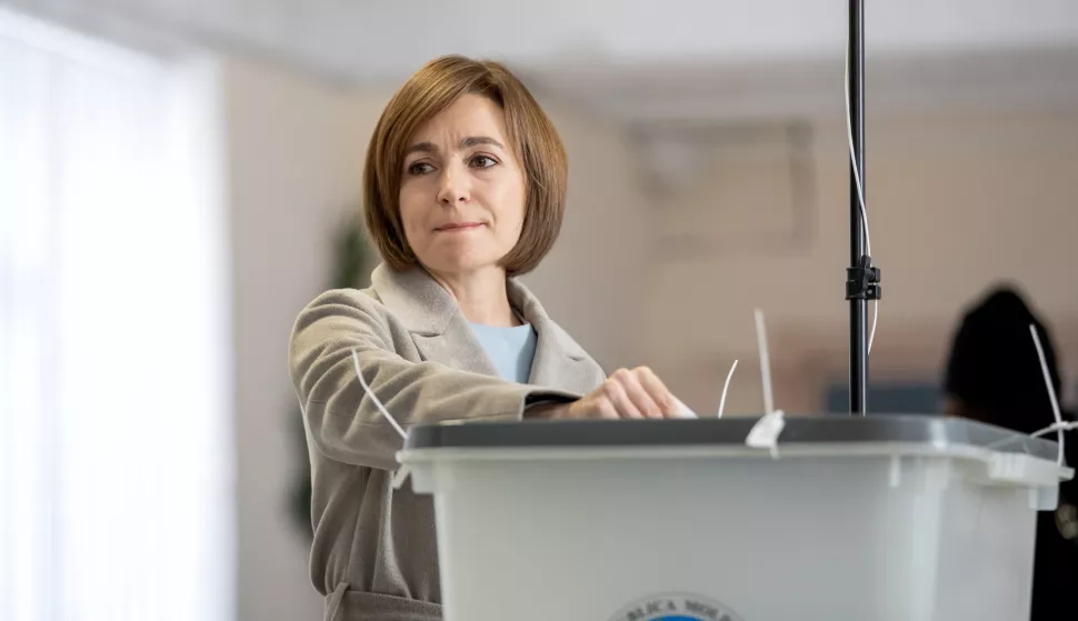 epa11698555 The incumbent President of Moldova, Maia Sandu, casts her vote at a polling station in Chisinau, Moldova, 03 November 2024. Moldova is holding second round of presidential elections, with former Attorney General of Moldova Alexandr Stoianoglo facing incumbent President of Moldova Maia Sandu. EPA/DUMITRU DORU