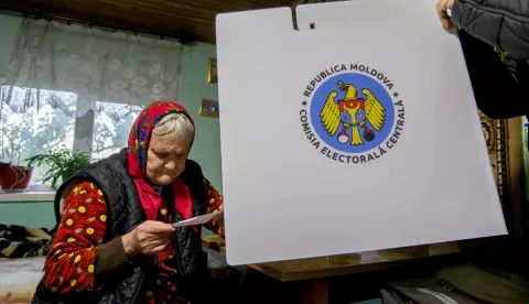 epa11699654 An elderly woman casts her vote in a mobile ballot box during the second round of presidential elections in the village of Ciopleni, Moldova, 03 November 2024. Moldova is holding second round of presidential elections, with former Attorney General of Moldova Alexandr Stoianoglo facing incumbent President of Moldova Maia Sandu. EPA/DUMITRU DORU