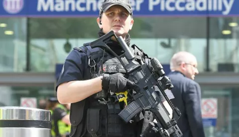 epa05983562 Armed police on patrol in central Manchester, Britain, 23 May 2017. According to a statement by the Greater Manchester Police, at least 22 people have been confirmed dead and around 59 others were injured, in an explosion at the Manchester Arena on the night of 22 May at the end of a concert by US singer Ariana Grande. Police believe that the explosion, which is being treated as a terrorist incident, was carried out by a single man using an improvised explosive device (IED), who was confirmed dead at the scene. British Prime Minister Theresa May in the meantime had condemned the incident as 'an appalling terrorist attack.' EPA/ANDY RAIN