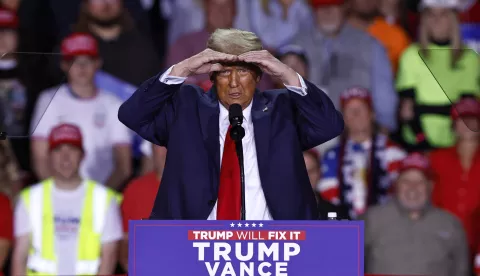 epa11701974 Republican presidential candidate and former US President Donald Trump gestures as he speaks during a campaign rally in Grand Rapids, Michigan, USA, 04 November 2024. Trump and Vice President and Democratic presidential nominee Kamala Harris are tied in the polls with one day until the election of 05 November. EPA/CJ GUNTHER