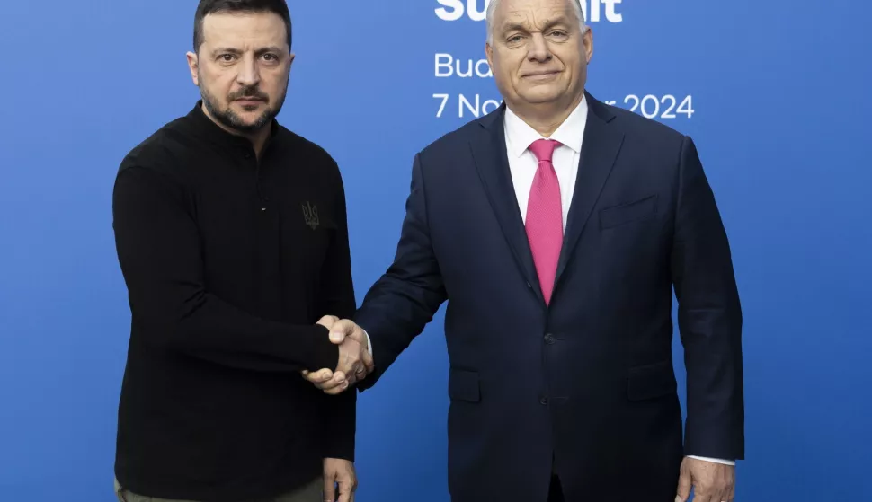 epa11707237 A handout photo made available by the Hungarian PM's Press Office shows Hungarian Prime Minister Viktor Orban (R) welcoming Ukrainian President Volodymyr Zelensky to the 5th summit of the European Political Community (EPC) held in Puskas Arena in Budapest, Hungary, 07 November 2024. EPA/VIVIEN CHER BENKO HANDOUT - EDITORIAL USE ONLY - NO SALESHANDOUT EDITORIAL USE ONLY/NO SALESHANDOUT EDITORIAL USE ONLY/NO SALESHANDOUT EDITORIAL USE ONLY/NO SALESHANDOUT EDITORIAL USE ONLY/NO SALES