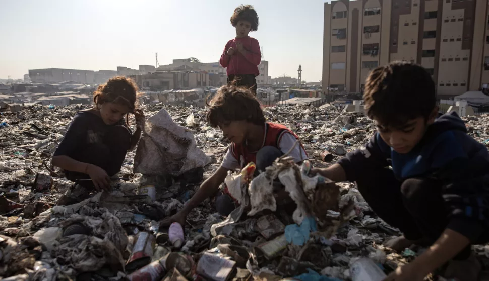 epa11700508 Palestinian children sort through garbage as they collect plastic from a landfill, amid a shortage of cooking gas and fuel, at the Khan Younis refugee camp, in the southern Gaza Strip, 04 November 2024. A United Nations Office for the Coordination of Humanitarian Affairs (OCHA) assessment carried out across some IDP camps in Gaza in May 2024 pointed to 'makeshift dwellings being made of blankets, nylon, and foraged materials. With no electricity, and cooking gas and wood being too expensive, families were resorting to burning trash and plastic to cook.' According to the UN, at least 1.9 million people across the Gaza Strip are internally displaced. Since October 2023, only about 11 percent of the Gaza Strip has not been placed under Israeli-issued evacuation orders, the UN aid coordination office OCHA said. EPA/HAITHAM IMAD