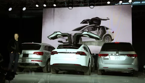 U.S.-AUTO-TESLA(150930) -- FREMONT, Sept. 30, 2015 (Xinhua) -- Tesla CEO Elon Musk introduces the falcon wing door on the Model X electric sports-utility vehicles during a presentation in Fremont, California, the United States, on Sept. 29, 2015. (Xinhua/Liu Yilin)Liu Yilin Photo: XINHUA/PIXSELL