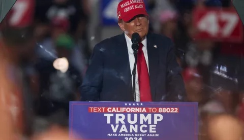 epa11656714 Former US President and current Republican presidential nominee Donald Trump speaks during an election rally in Coachella, California, 12 October 2024. EPA/ALLISON DINNER