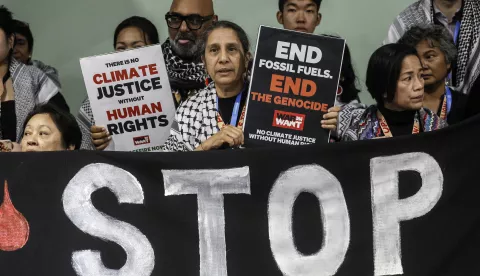 epa11714400 Climate activists from the COP29 Climate Justice Coalition stage a protest in support of the Palestinian people during the UN Climate Change Conference (COP29) in Baku, Azerbaijan, 11 November 2024. The Azerbaijani capital of Baku hosts the 2024 United Nations Climate Change Conference (COP29) from 11 to 22 November 2024. EPA/ANATOLY MALTSEV