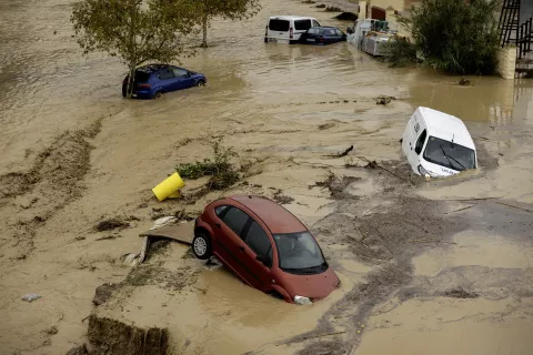 epa11690460 A view of partially submerged vehicles after the Guadalhorce River burst its banks following torrential rains in Alora, Malaga, Spain, 29 October 2024. The area is currently facing significant rainfall. EPA/JORGE ZAPATA