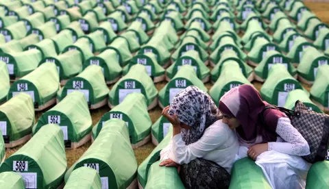 epa07726774 (FILE) A file photo dated 11 July 2010 shows Bosnian Muslim women mourn over a casket during the funeral of 775 newly-identified Bosnian Muslims at the Potocari Memorial Center in Srebrenica, Bosnia and Herzegovina (reissued 19 July 2019). The Dutch Supreme Court in a cassation proceedings of the Mothers of Srebrenica case against the Dutch State, in The Hague, The Netherlands, on 19 July 2019 ruled that the Netherlands was partially responsible for some of the deaths at Srebrenica. The Mothers of Srebrenica is a group of lobbyists and activists representing the survivors of the siege of the town of Srebrenica during the Balkan Wars. The group alleges that both the UN and the Netherlands are liable for the failure to prevent the massacre at Srebrenica in July 1995, in which 8,000 Muslim men were killed by Bosnian forces. EPA/FEHIM DEMIR *** Local Caption *** 00000402404574