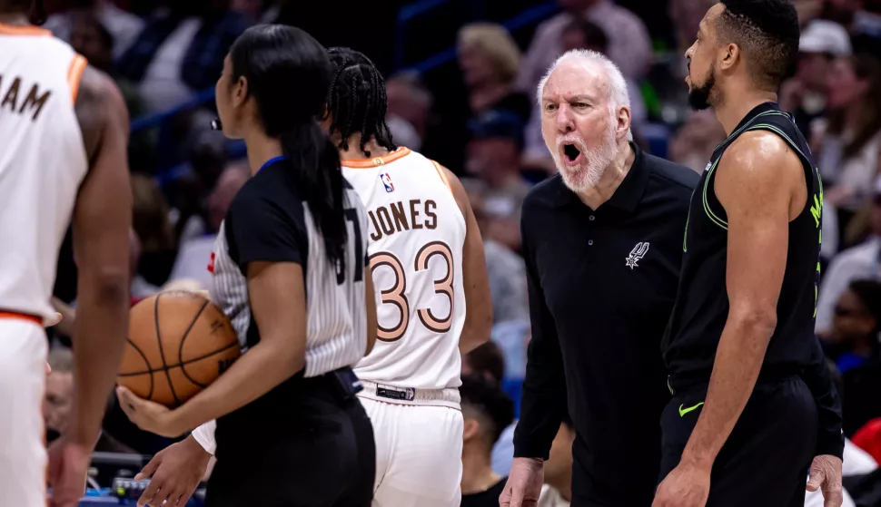 Apr 5, 2024; New Orleans, Louisiana, USA; San Antonio Spurs head coach Gregg Popovich disagrees with referee Danielle Scott (87) about a play call against the New Orleans Pelicans during the first half at Smoothie King Center. Mandatory Credit: Stephen Lew-USA TODAY Sports/Sipa USA Photo: USA Today Sports/SIPA USA