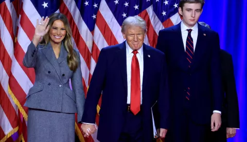 epa11704670 Republican presidential candidate Donald J. Trump, joined by his wife Melania Trump and their son Barron Trump, looks on after addressing supporters at the Election Night watch party in the West Palm Beach Convention Center in West Palm Beach, Florida, USA, 06 November 2024. EPA/CRISTOBAL HERRERA-ULASHKEVICH