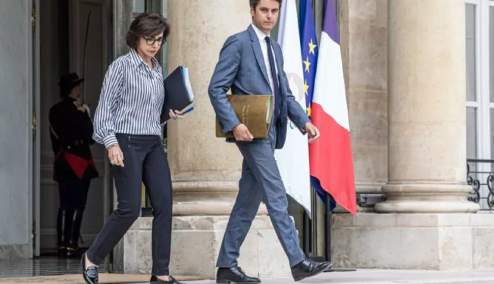 epa11454517 French Prime Minister Gabriel Attal (R) and Culture Minister Rachida Dati (L) leave after the weekly cabinet meeting at Elysee palace in Paris, France, 03 July 2024. This is the last meeting of French government prior to the second round of general elections scheduled for 07 July. EPA/CHRISTOPHE PETIT TESSON