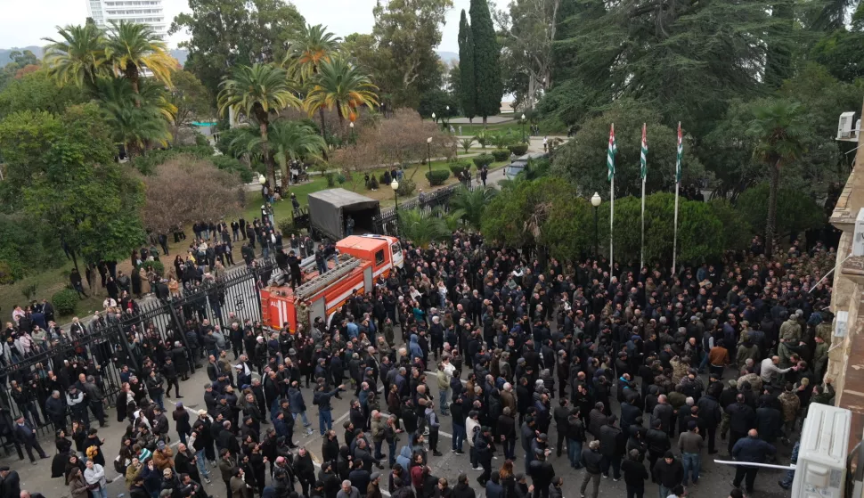 epa11723417 People protest outside the parliament building in Sukhumi, capital of the self-proclaimed Republic of Abkhazia, 15 November 2024. The opposition that seized the government building complex demand the resignation of the current President of the country Aslan Bzhania. The Parliament of Abkhazia had previously planned a meeting on the ratification of the agreement with Russia concerning the implementation of investment projects by Russian companies in the republic, which the opposition claim will harm Abkhazia. Abkhazia is a breakaway territory which was part of Georgia until 2008, and it is currently recognized by a minority of world countries, including Russia. EPA/STRINGER