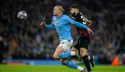 (230315) -- MANCHESTER, March 15, 2023 (Xinhua) -- Manchester City's Erling Haaland (L) is challenged by Leipzig's Josko Gvardiol during the UEFA Champions League Round of 16 2nd Leg match between Manchester City and Leipzig in Manchester, Britain, on March 14, 2023. (Xinhua) Photo: Li Ying/XINHUA