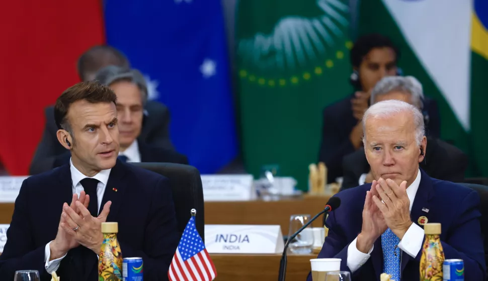 epa11727494 US President Joe Biden (R) and French President Emmanuel Macron participate at the opening of the G20 Summit of Heads of State in Rio de Janeiro, Brazil, 18 November 2024. The G20 summit will bring together leaders from 55 nations and organizations on 18 and 19 November at the Museum of Modern Art in Rio de Janeiro. EPA/ANTONIO LACERDA