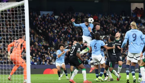 epa11742471 Josko Gvardiol of Manchester City (C) heads the ball during the UEFA Champions League match between Manchester City and Feyenoord in Manchester, Britain, 26 November 2024. EPA/ADAM VAUGHAN