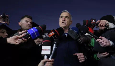 epa11741846 Far-right independent runoff candidate Calin Georgescu delivers a speech during a media statement following his surprise win in the first round of presidential elections, in front of his residence in Izvorani village, 40 Km north from Bucharest, Romania, 26 November 2024. Calin Georgescu led in the first round of the presidential race, winning 22.94 percent of the total number of votes, followed by Elena Lasconi, leader of the USR (Save Romania Union), with 19.18 percent. The second round of Romania's presidential election will be held on 08 December 2024. EPA/ROBERT GHEMENT