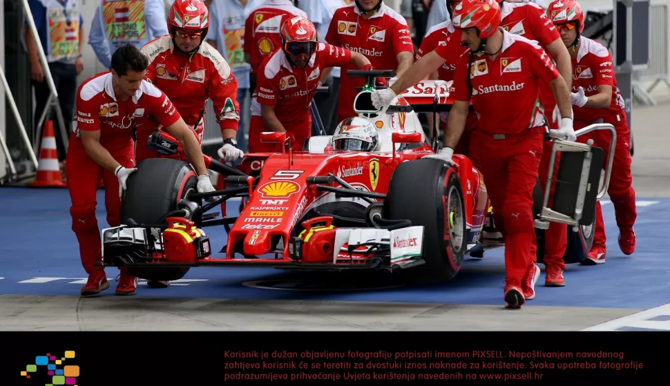 Ferrari driver Sebastian Vettel of Germany gets pushed back into his garage during the qualifying session prior to the Formula One Grand Prix, at the Red Bull Ring in Spielberg, southern Austria, Saturday, July 2, 2016. Photo: Ronald Zak/dpa | usage worldwide /DPA/PIXSELL