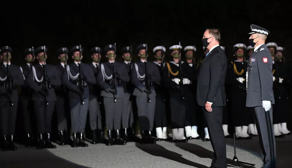 epa08638468 Polish President Andrze Duda (2R) attends a ceremony marking the 81st anniversary of the outbreak of World War II at the Monument to the Defenders of Westerplatte in the Westerplatte peninsula, in Gdansk, Poland, 01 September 2020. World War II began when the German Navy destroyer 'Schleswig-Holstein' fired on the Westerplatte fortifications at 04:45am on 01 September 1939. EPA/Adam Warzawa POLAND OUT