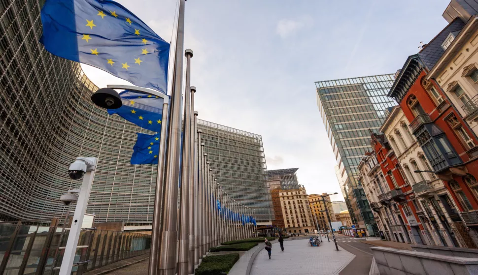 epa11046659 Flags are flown half-mast in honor of Jacques Delors at the European Commission in Brussels, Belgium, 28 December 2023. The former European Commission President and architect of the modern EU has died at age 98, his family announced on 27 December 2023. EPA/OLIVIER MATTHYS