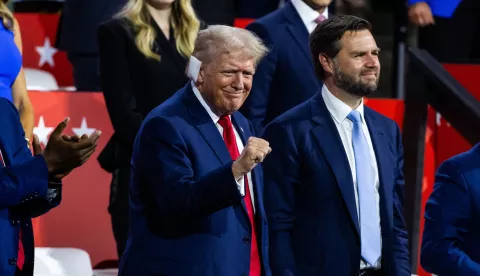 epa11480844 Republican presidential nominee and former President Donald Trump (L) alongside his vice presidential nominee JD Vance (R), look on during the evening session on the opening day of the Republican National Convention (RNC) at the Fiserv Forum in Milwaukee, Wisconsin, USA, 15 July 2024. The convention comes just a few days after a 20-year-old Pennsylvania man attempted to assassinate former president and current Republic presidential nominee Donald Trump. The RNC is being held 15 to 18 July 2024 and is where delegates from the Republican Party select their nominees for president and vice president in the 2024 US presidential election. EPA/JIM LO SCALZO