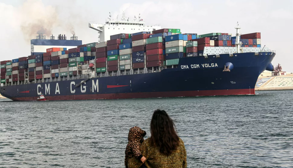 (240113) -- CAIRO, Jan. 13, 2024 (Xinhua) -- A cargo ship travels on the Suez Canal in Ismailia Province, Egypt, Jan. 13, 2024. Chairman of Egypt's Suez Canal Authority (SCA) Osama Rabie said on Friday that navigation traffic in the canal is regular in both directions. In a statement, Rabie denied reports about the temporary suspension of navigation in the Suez Canal as a result of the tension in the Red Sea's strategic Bab-el-Mandeb area. (Xinhua/Ahmed Gomaa) Photo: Ahmed Gomaa/XINHUA