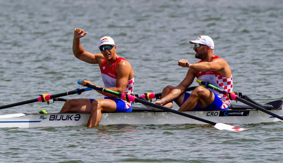 epa10022227 Martin Sinkovic and Valent Sinkovic of Croatia react after the men's double sculls final race of the Rowing World Cup in Poznan, west-central Poland, 19 June 2022. EPA/Pawel Jaskolka POLAND OUT