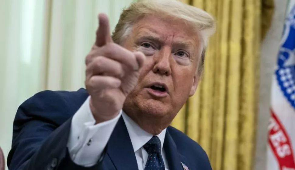 epa08450844 US President Donald J. Trump makes remarks before signing an executive order on social media that will punish Facebook, Google and Twitter for the way they police content online, in the Oval Office, White House, Washington, DC, USA, 28 May 2020. EPA/DOUG MILLS/ POOL