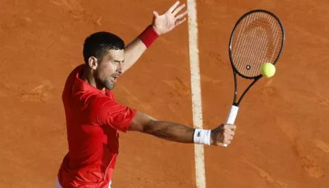 epa11276656 Novak Djokovic of Serbia in action during his semi final match against Casper Ruud of Norway at the ATP Monte Carlo Masters tennis tournament in Roquebrune Cap Martin, France, 13 April 2024. EPA/SEBASTIEN NOGIER