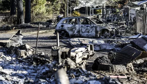 epa11498494 The burned remains destroyed by the Park Fire, which has currently burned over 170,000 acres according to the California Department of Forestry and Fire Protection (Cal Fire), in Butte County, California, USA, 26 July 2024. According to a press release from Butte County District Attorney Mike Ramsey, a 42-year-old man from Chico, California was arrested for allegedly pushing a burning car into a gully which set off the Park Fire. As of today, according to Cal Fire, the fire was 0 percent contained. EPA/JOHN G. MABANGLO