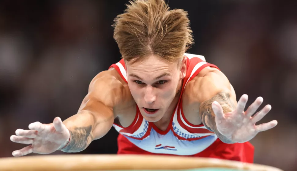 Pariz, 04.08.2024 - Hrvatski gimnastičar Filip Benović tijekom finala preskoka na Olimpijskim igrama Pariz 2024. foto HINA/ Damir SENČAR/ ds