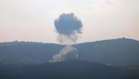 epa11531129 Smoke rises as a following Israeli shelling on the village of Kfarkila, south Lebanon, as seen form the Upper Galilee, northern Israel, 06 August 2024. The Israeli army reported that the Aerial Defense Array successfully intercepted 40 missiles fired from Lebanon. EPA/ATEF SAFADI