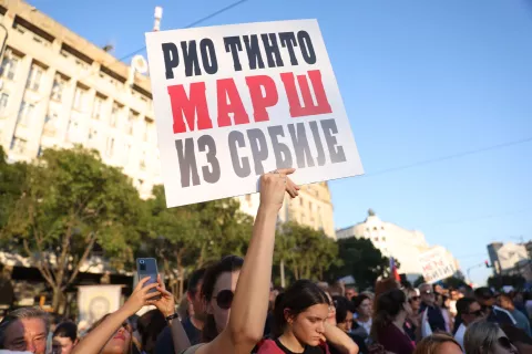 epa11543633 A protestor holds a sign reading 'Rio Tinto, Get out of Serbia' during a rally against plans to start mining lithium in Serbia, in Belgrade, Serbia, 10 August 2024. Plans to open lithium mines in Serbia were halted in 2021 after environmental groups started protesting against the proposed projects in different parts of Serbia but several wildlife preservation organizations and NGOs are warning that Rio Tinto and other mining companies have restarted their intentions for operations in the country. EPA/ANDREJ CUKIC