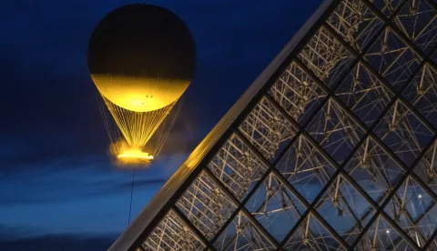 The Olympic Cauldron rises after sunset near the Pyramid of the Louvre in Paris, France on Tuesday, August 6, 2024. The Olympic electric flame is 100 feet high with a 22-foot diameter ring of fire, and rises 200 feet in the air for a few hours every night. The 2024 Summer Games in Paris continues through August 11th. Photo by Pat Benic/UPI Photo via Newscom Photo: Pat Benic/NEWSCOM