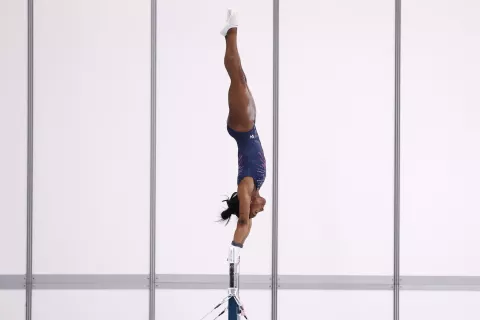 epa11493873 Simone Biles of USA trains on the uneven bars during a training session for the Paris 2024 Olympic Games, in Paris, France, 24 July 2024. EPA/ANNA SZILAGYI