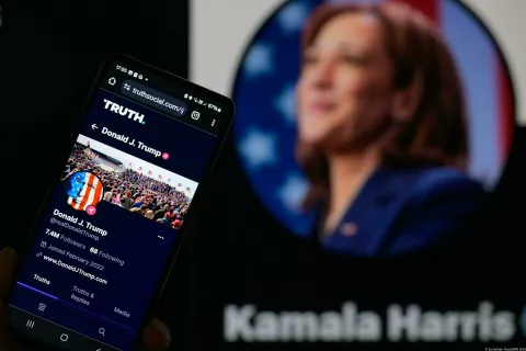 Donald Trump account on Truth is being displayed on a smartphone, with Kamala Harris account on X in the background, seen in this photo illustration.Taken in Brussels, Belgium. On July 25, 2024. (Jonathan Raa/Sipa USA) *** Strictly for editorial news purposes only *** Photo: Jonathan Raa/SIPA USA